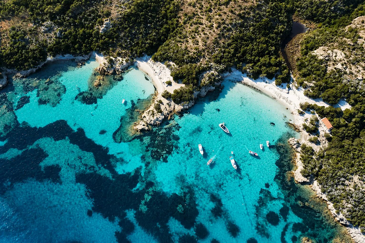 Boats anchored between two La Maddalena coves