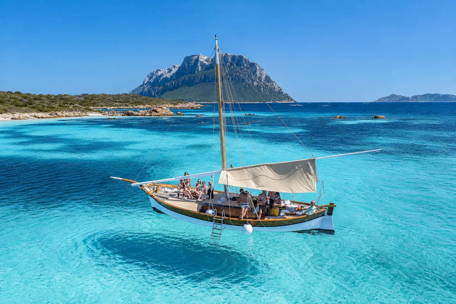 A traditional sailing boat on the Tavolara and Molara route
